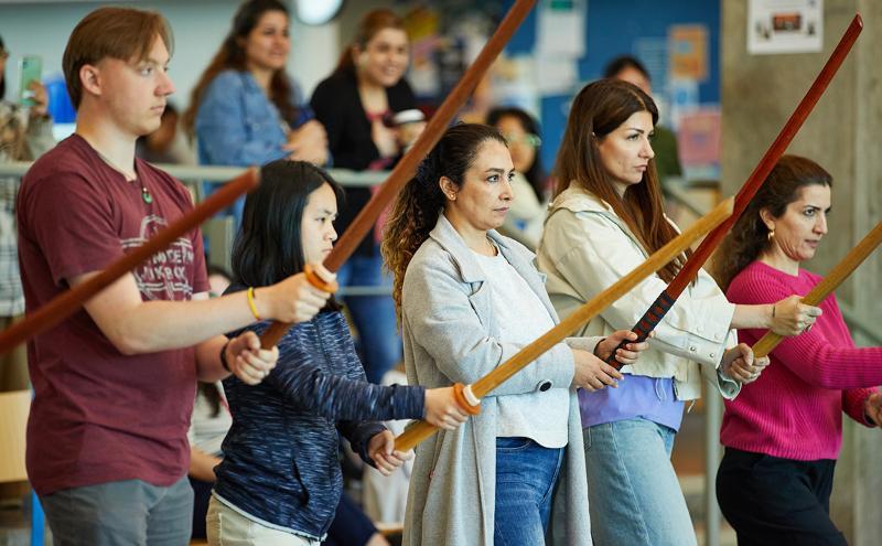 Staff and students practice Japanese sword performance