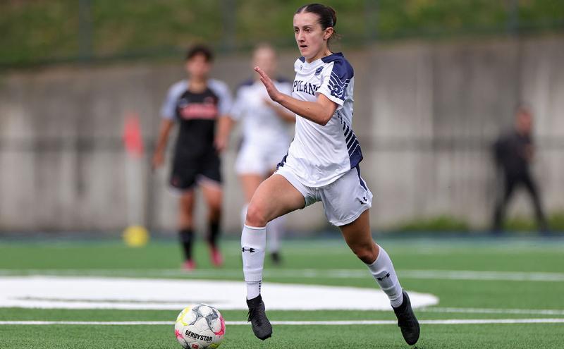 Capilano Blues midfielder Michaela Salvino moves the ball up the park