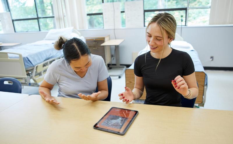 Students in the Rehabilitation Assistant Diploma program take part in hands-on learning