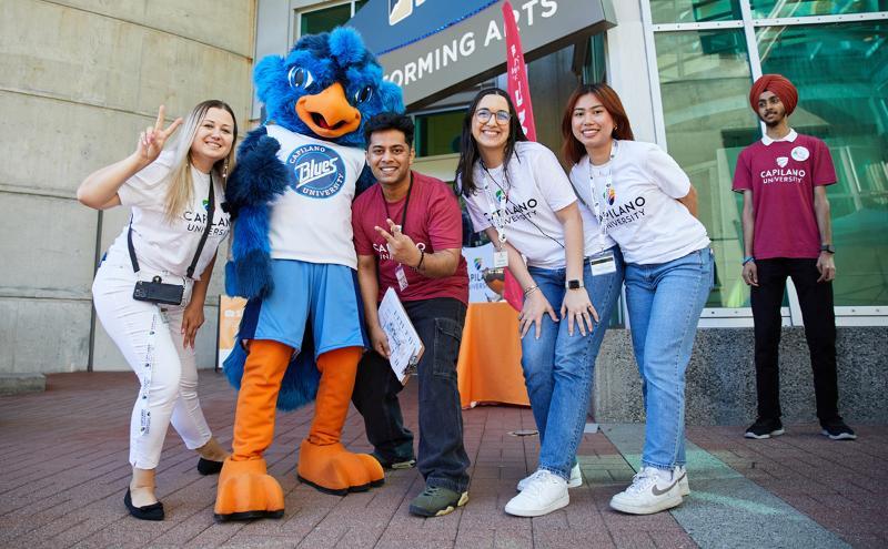 Our student ambassadors and recruitment team with Jay the CapU Blues Mascot