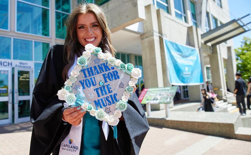 A happy CapU grad