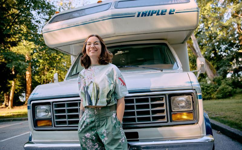 CapU alumni and Tourism Management graduate Sophie Cheshire with her RV before embarking on a road trip to research sustainable tourism