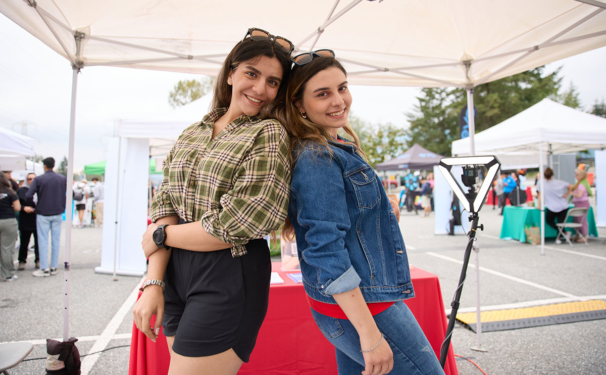 New students having a blast at the GlamBOT station