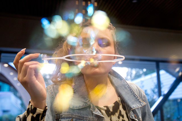 Blowing bubbles at a School of Communication graduation party on April 6, 2018. 