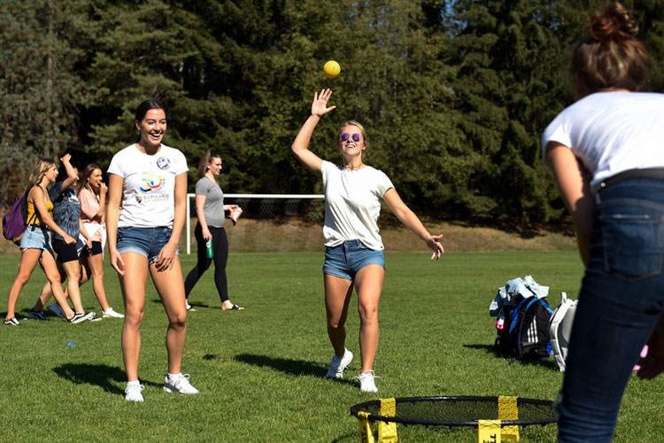 Students play Spikeball before a Capilano Blues exhibition soccer game on Wednesday, Sept. 5, 2018.