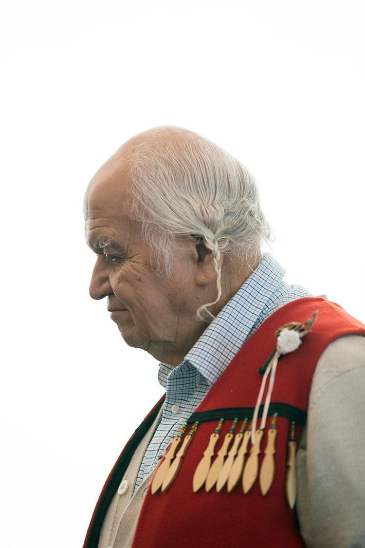 Elder-in-residence Sla-holt (Ernest George) listens to a speaker during the Truth and Reconciliation Week Welcome and Blessing on Monday, Sept. 24, 2018.