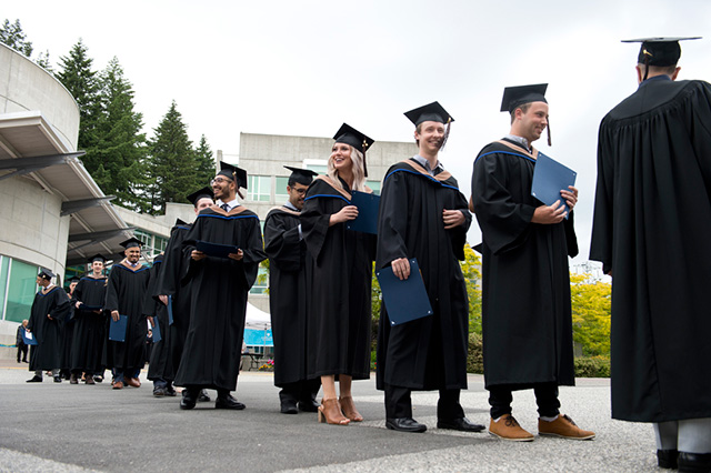 Students enter their Convocation Ceremony at Capilano University on Tuesday, June 5, 2018.
