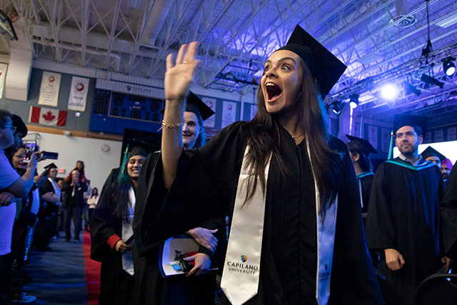 Greeting loved ones during Convocation ceremonies on Feb. 21, 2020. (Photo by Tae Hoon Kim)