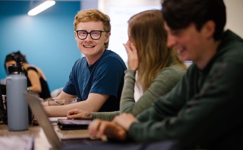 Students talking in Library