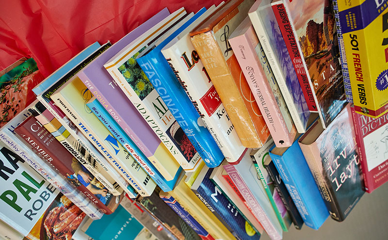A selection of books for sale at the United Way table in the Birch Building.