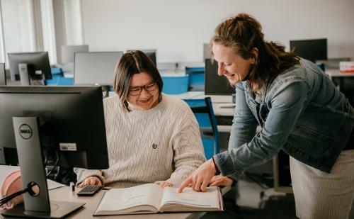 Student talking to instructor