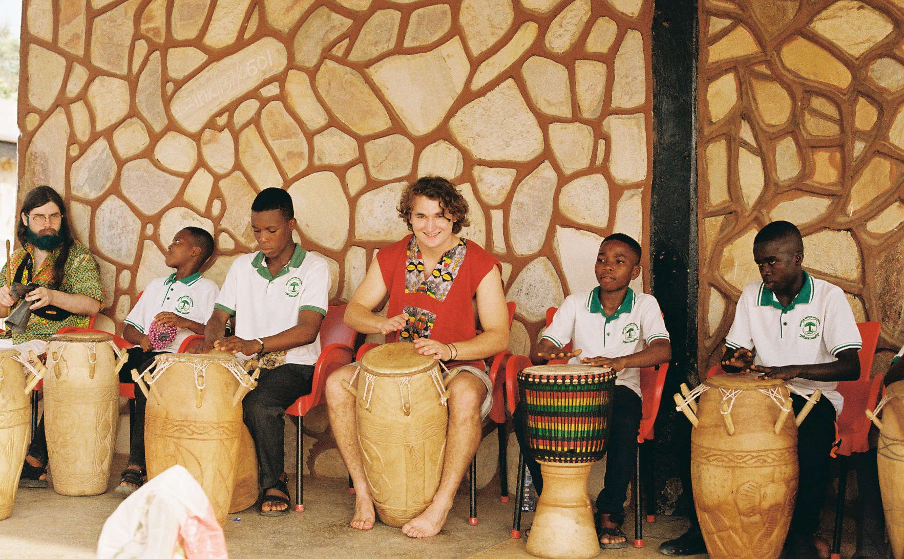 Students playing drums in Ghana