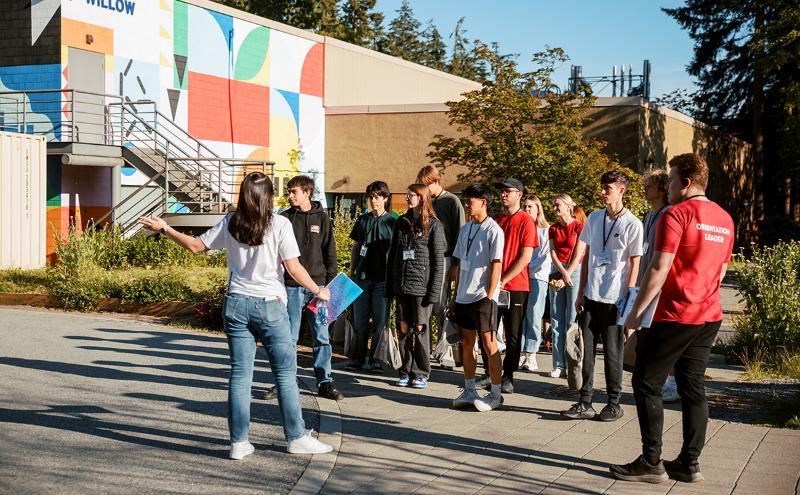 Students touring campus as part of Explore CapU