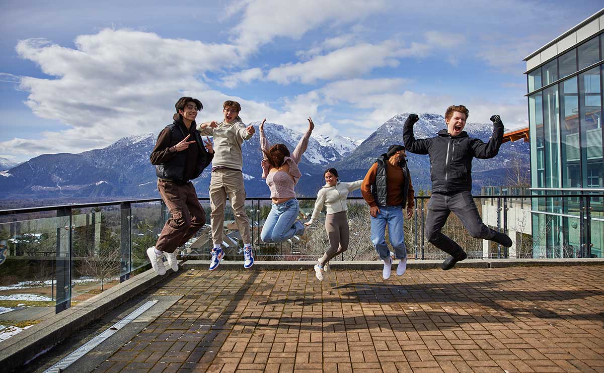 CapU students jumping for joy at the Squamish Campus.