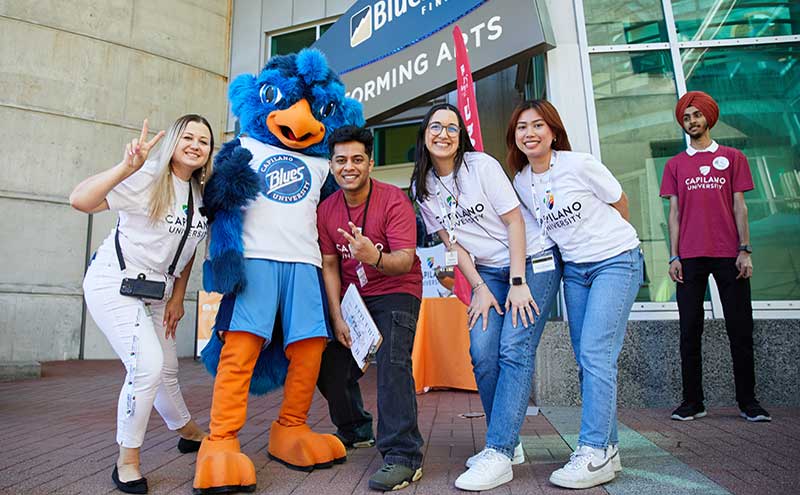 Members of the CapU Student Recruitment team with Jay.