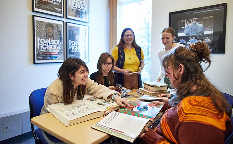 Costuming for Stage and Screen students in the CapU costume library.