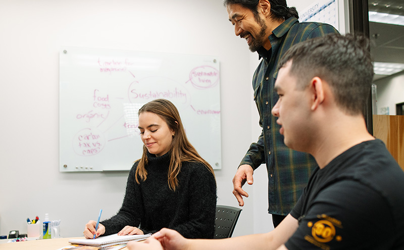 Faculty and students in class