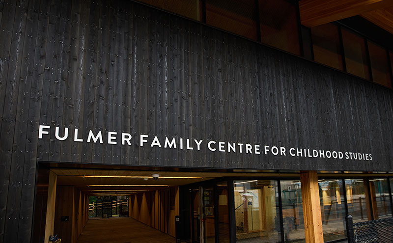 Outdoor sign welcoming people to the Fulmer Family Centre for Childhood Studies.