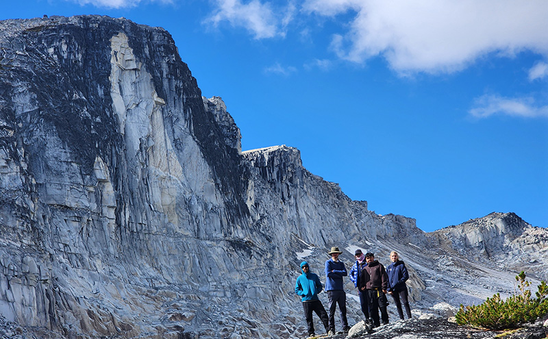 Outdoor Recreation Management students standing in front of a mountain peak.