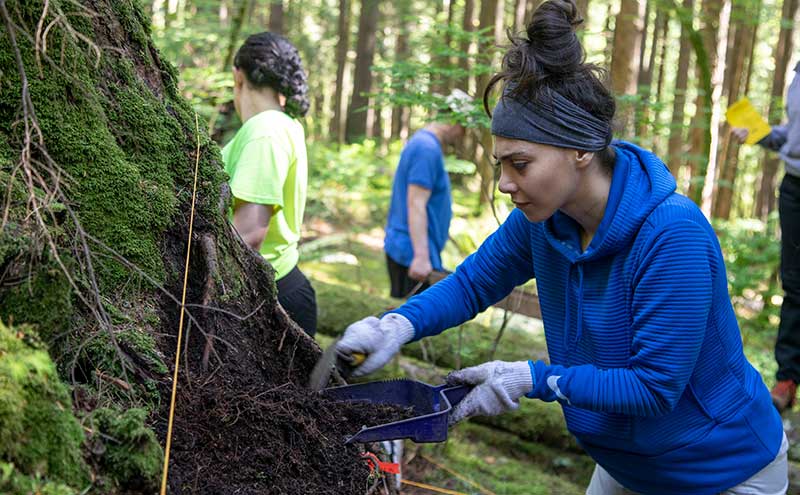 CapU student on an archaeological dig.