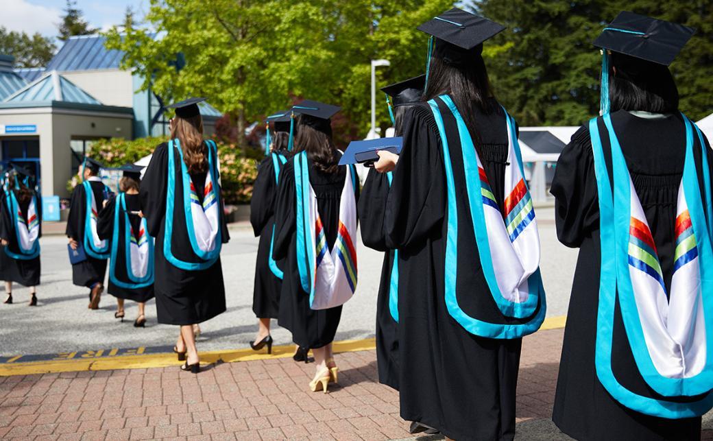 Students outside in gowns