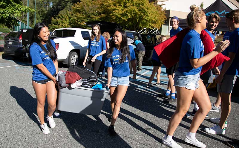 CapU Blues student-athletes pitch in on move-in day.