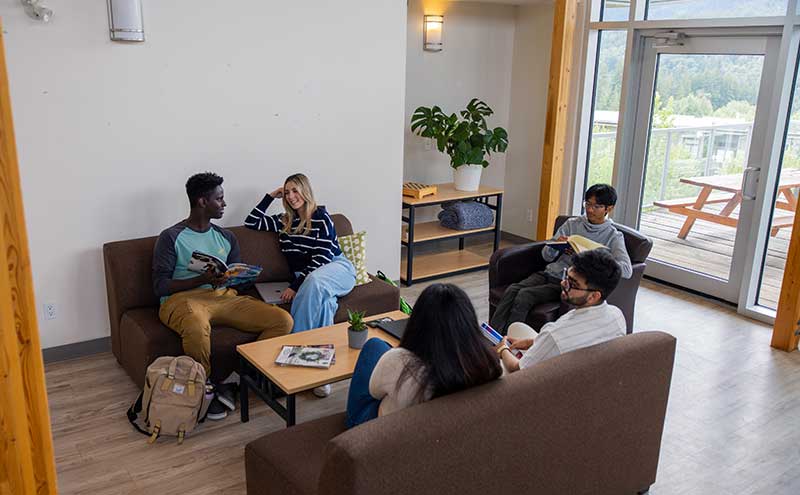 Relaxing in one of the many available common areas in Squamish Campus housing.