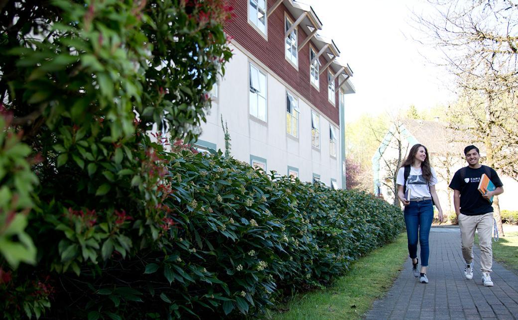 Students walking outside CapU North Vancouver Housing